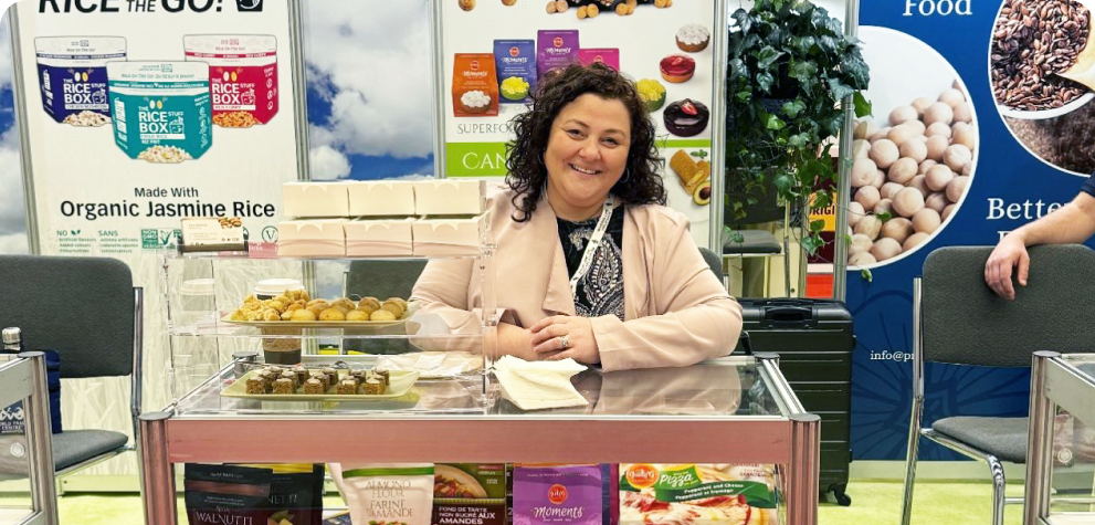 Woman stands behind Piccola Cucina Desk